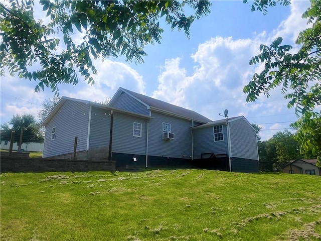 254 Bicker Rd, Winfield Twp, PA 16023 - rear view of house featuring a lawn