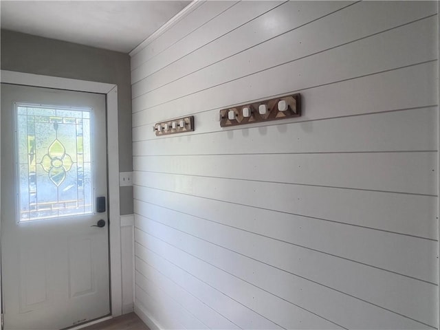 254 Bicker Rd, Winfield Twp, PA 16023 - doorway to outside with wooden walls and wood finished floors