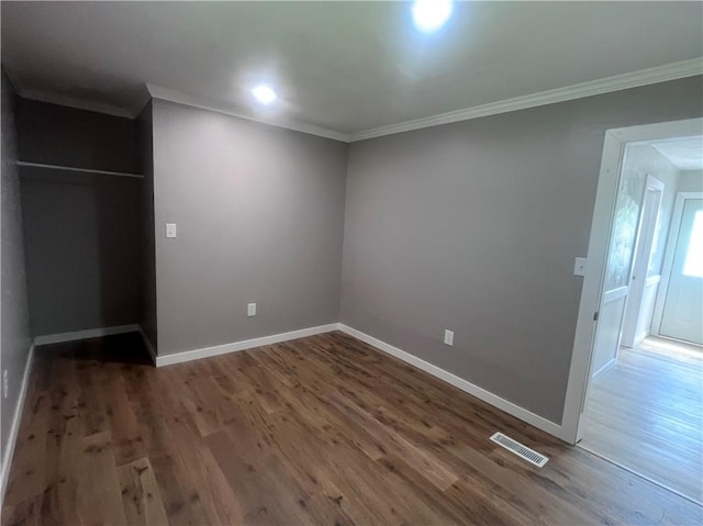 254 Bicker Rd, Winfield Twp, PA 16023 - unfurnished bedroom with wood finished floors, crown molding, and baseboards