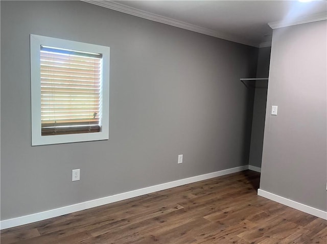 254 Bicker Rd, Winfield Twp, PA 16023 - empty room featuring ornamental molding, baseboards, and wood finished floors
