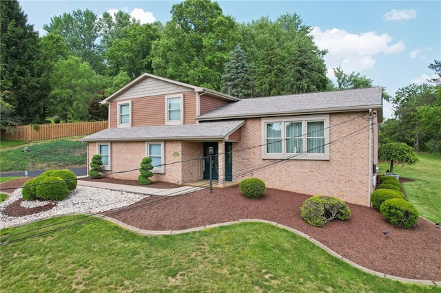 100 Welty Dr, Allegheny Twp Wml, PA 15068 - split level home featuring brick siding and roof with shingles
