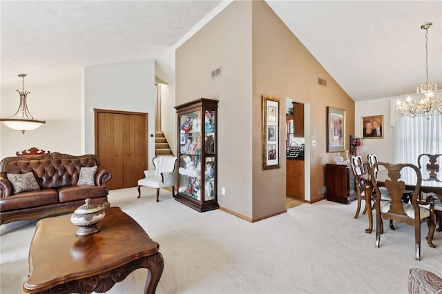 100 Welty Dr, Allegheny Twp Wml, PA 15068 - living area with a chandelier, high vaulted ceiling, light carpet, baseboards, and stairway