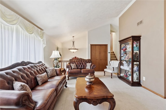 100 Welty Dr, Allegheny Twp Wml, PA 15068 - living area featuring carpet, lofted ceiling, and baseboards