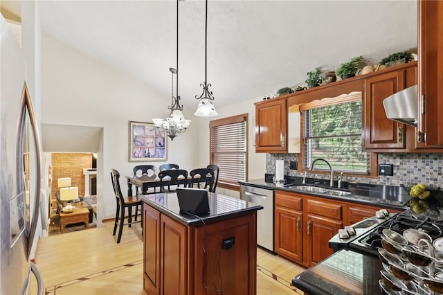 100 Welty Dr, Allegheny Twp Wml, PA 15068 - kitchen featuring a sink, extractor fan, stainless steel appliances, tasteful backsplash, and light wood finished floors