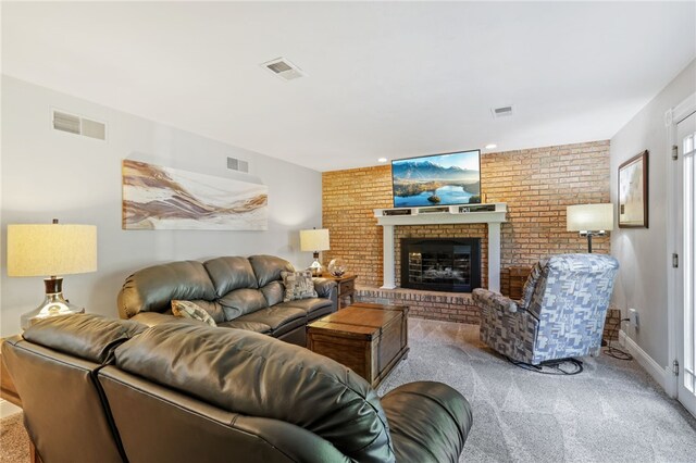 100 Welty Dr, Allegheny Twp Wml, PA 15068 - carpeted living room featuring a fireplace and recessed lighting