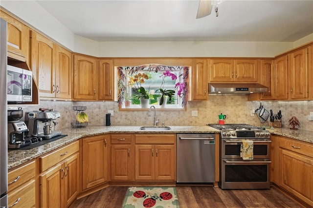 240 Patton Dr, Moon/Crescent Twp, PA 15108 - kitchen featuring appliances with stainless steel finishes, a sink, ventilation hood, and light stone counters