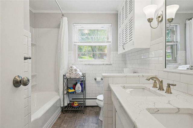 240 Patton Dr, Moon/Crescent Twp, PA 15108 - bathroom with ornamental molding, vanity, wood finished floors, shower / tub combo, and toilet