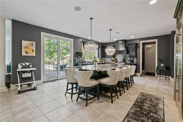 623 Oswego Dr, Adams Twp, PA 15044 - dining room with a chandelier, light tile patterned floors, baseboards, and recessed lighting