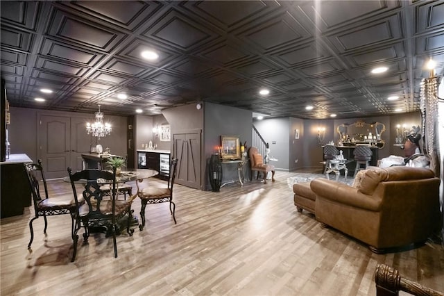 623 Oswego Dr, Adams Twp, PA 15044 - dining area with an ornate ceiling, stairs, a chandelier, light wood finished floors, and recessed lighting