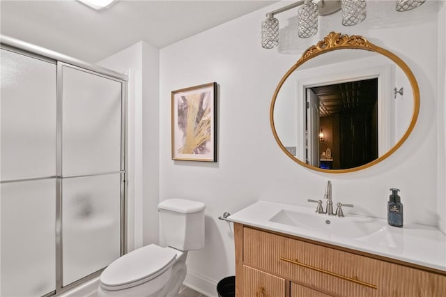 623 Oswego Dr, Adams Twp, PA 15044 - full bathroom featuring vanity, a stall shower, toilet, and baseboards