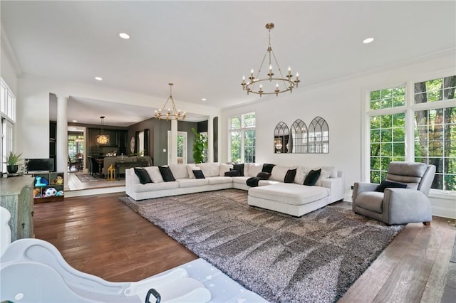 623 Oswego Dr, Adams Twp, PA 15044 - living area with a chandelier, wood finished floors, recessed lighting, crown molding, and ornate columns