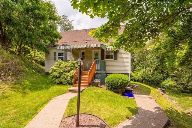 1853 Montour St, Coraopolis, PA 15108 - bungalow-style home with a front lawn and a shingled roof
