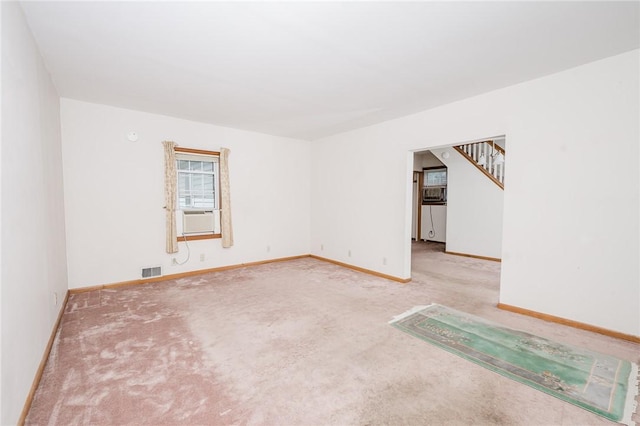 38 Locust St, Center Twp/Homer Cty, PA 15731 - carpeted spare room featuring baseboards, stairs, and cooling unit