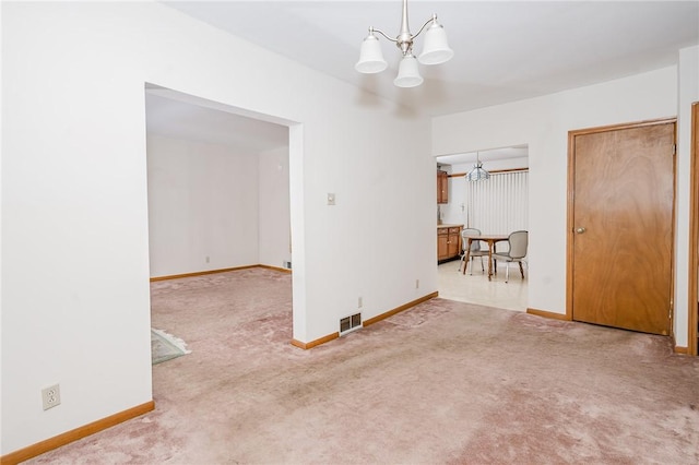 38 Locust St, Center Twp/Homer Cty, PA 15731 - spare room with a chandelier and carpet floors