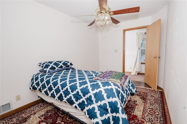 38 Locust St, Center Twp/Homer Cty, PA 15731 - bedroom featuring a ceiling fan, baseboards, and wood finished floors