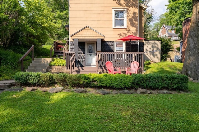 710 Beaver St, Leetsdale, PA 15056 - view of front of home with a deck, stairs, and a front yard