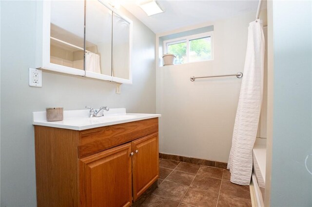 710 Beaver St, Leetsdale, PA 15056 - full bathroom with vanity, baseboards, and shower / bathtub combination with curtain