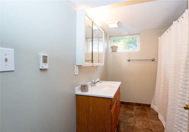 710 Beaver St, Leetsdale, PA 15056 - full bath featuring vanity, tile patterned flooring, and baseboards