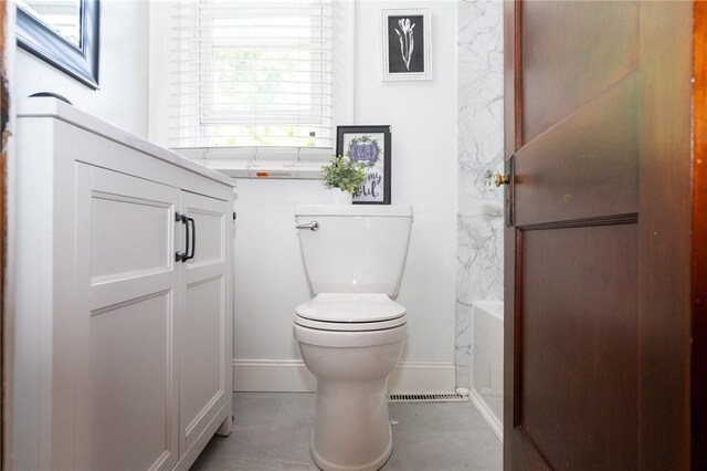 710 Beaver St, Leetsdale, PA 15056 - bathroom with toilet, baseboards, a bathtub, and a shower