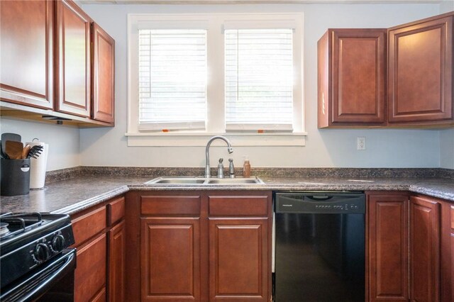 710 Beaver St, Leetsdale, PA 15056 - kitchen with black dishwasher, a sink, and dark countertops