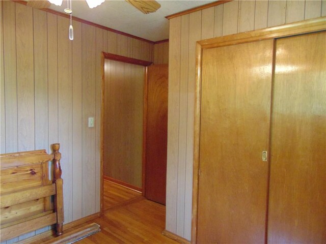 822 Fayette City Rd, Washington Twp, PA 15438 - hall featuring wood finished floors, wooden walls, and ornamental molding