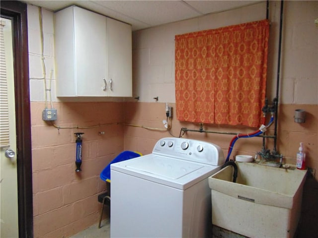 822 Fayette City Rd, Washington Twp, PA 15438 - washroom featuring washer / clothes dryer, cabinet space, and concrete block wall