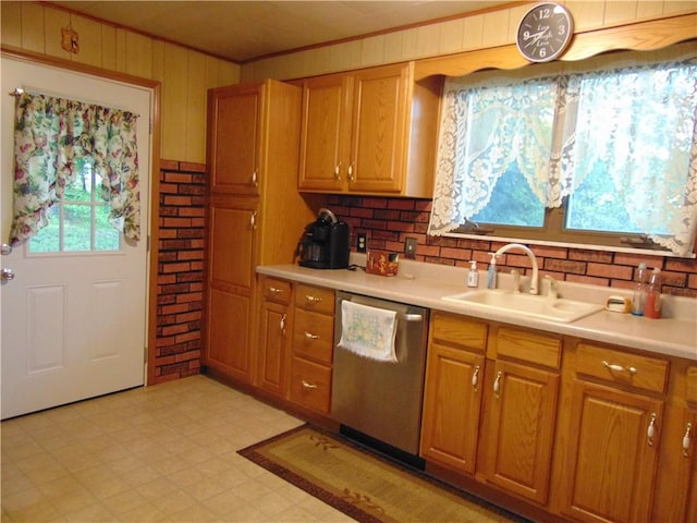 822 Fayette City Rd, Washington Twp, PA 15438 - kitchen featuring stainless steel dishwasher, a sink, ornamental molding, light floors, and light countertops