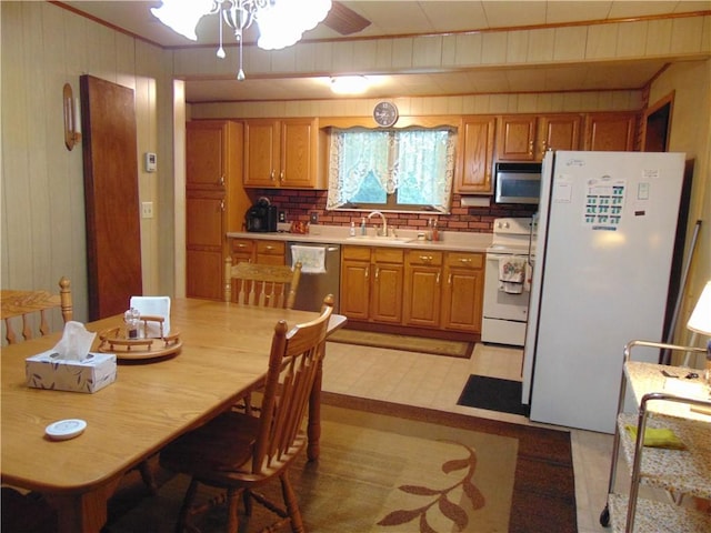 822 Fayette City Rd, Washington Twp, PA 15438 - kitchen featuring appliances with stainless steel finishes, a sink, a ceiling fan, light countertops, and tasteful backsplash