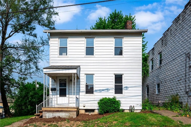 330 N Elm St, City Of But Nw, PA 16001 - traditional-style house featuring a chimney