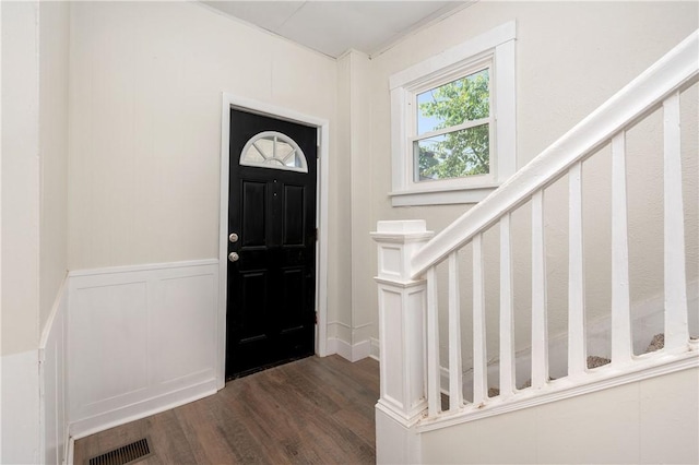 330 N Elm St, City Of But Nw, PA 16001 - foyer entrance featuring a decorative wall, dark wood-style floors, stairs, and a wainscoted wall