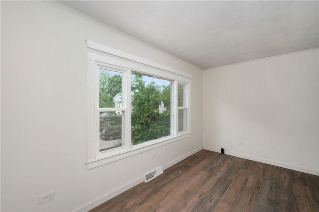 330 N Elm St, City Of But Nw, PA 16001 - unfurnished room featuring baseboards, dark wood finished floors, and crown molding