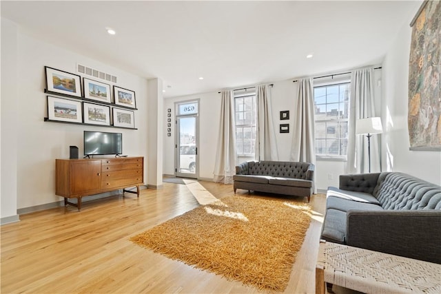 626 Suismon St, East Allegheny, PA 15212 - living room featuring light wood-style floors, recessed lighting, and baseboards