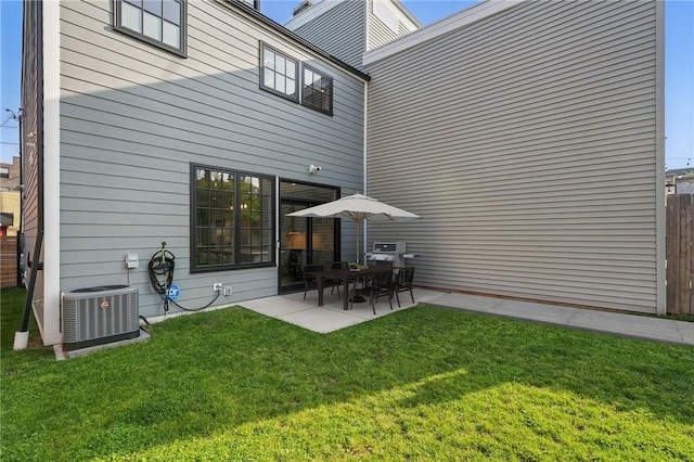 626 Suismon St, East Allegheny, PA 15212 - rear view of house with cooling unit and a patio