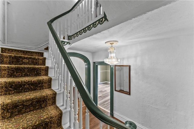 222 Marshall Ave, Observatory Hill, PA 15214 - staircase with a chandelier, baseboards, and wood finished floors