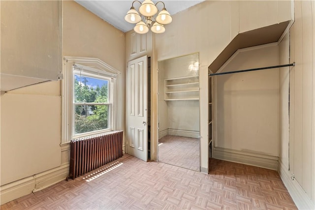 222 Marshall Ave, Observatory Hill, PA 15214 - spacious closet featuring radiator heating unit, a chandelier, and a high ceiling