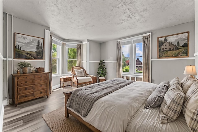 222 Marshall Ave, Observatory Hill, PA 15214 - bedroom with multiple windows and wood finished floors