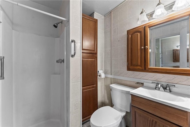 222 Marshall Ave, Observatory Hill, PA 15214 - bathroom with tile walls, a stall shower, vanity, and toilet