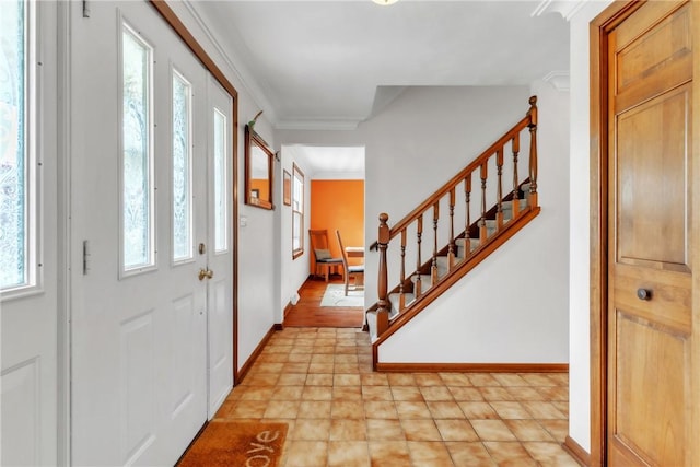 106 Shawnee Dr, Center Twp But, PA 16001 - entrance foyer featuring healthy amount of natural light, stairway, baseboards, and ornamental molding