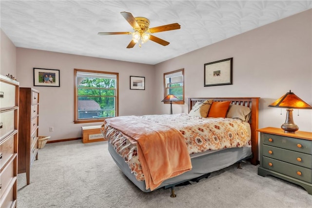 106 Shawnee Dr, Center Twp But, PA 16001 - bedroom featuring light carpet, baseboards, and a ceiling fan