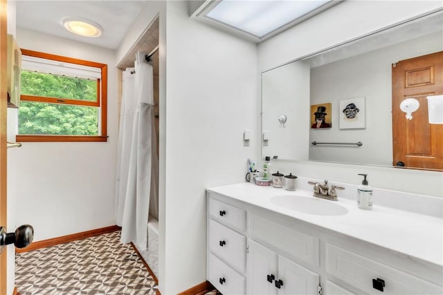106 Shawnee Dr, Center Twp But, PA 16001 - full bath with tile patterned floors, vanity, shower / bath combo, and baseboards