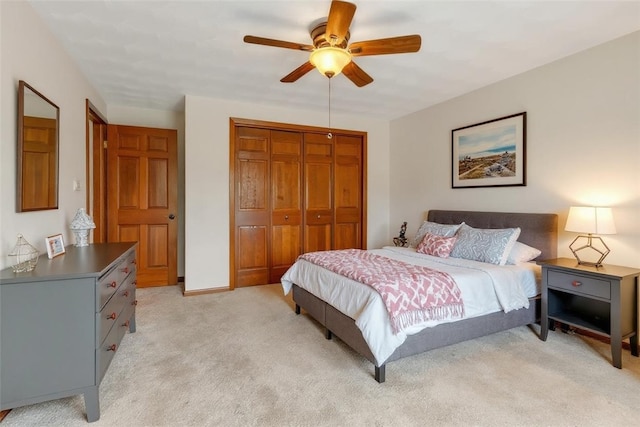 106 Shawnee Dr, Center Twp, PA 16001 - bedroom with a closet, light carpet, and a ceiling fan