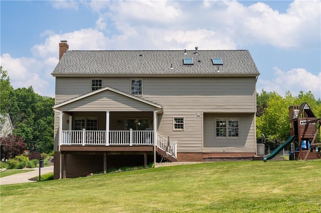 215 Warren Rd, Marshall, PA 15086 - back of property featuring a playground, a lawn, a chimney, and central air condition unit