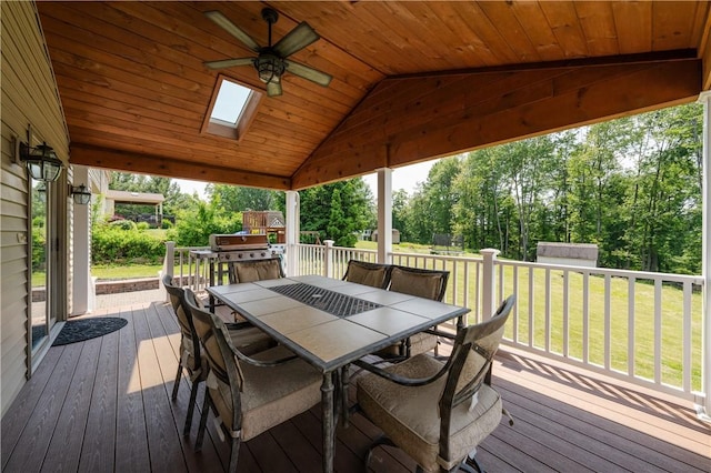 215 Warren Rd, Marshall, PA 15086 - wooden terrace with outdoor dining space, ceiling fan, a yard, and view of scattered trees