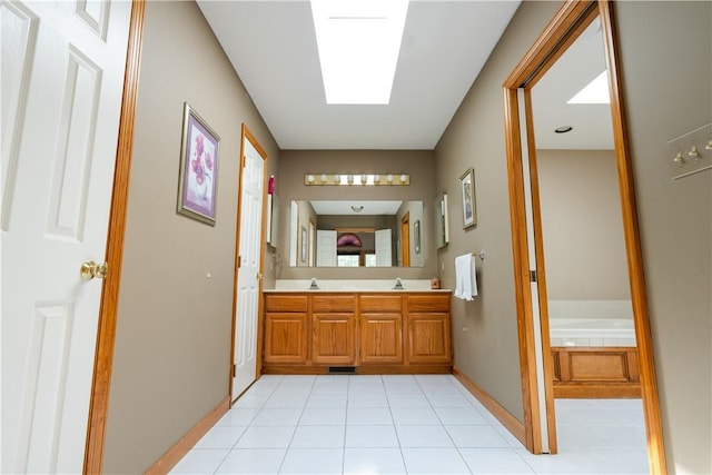 215 Warren Rd, Marshall, PA 15086 - bathroom featuring double vanity, tile patterned flooring, a bath, and baseboards