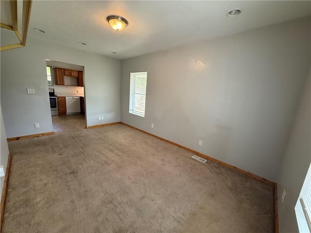 635 Valley St, Oakmont, PA 15139 - unfurnished living room with light colored carpet and baseboards