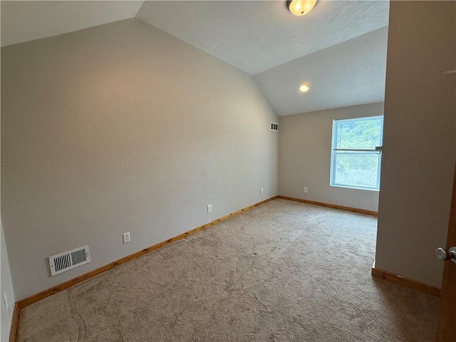 635 Valley St, Oakmont, PA 15139 - carpeted spare room with lofted ceiling and baseboards