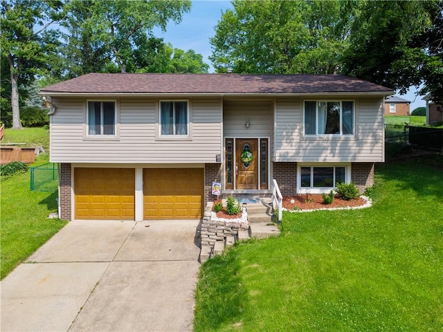 102 Castle Hill Rd, Monroeville, PA 15146 - bi-level home with a garage, brick siding, and concrete driveway
