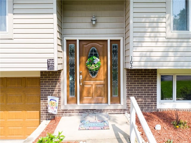 102 Castle Hill Rd, Monroeville, PA 15146 - view of exterior entry featuring brick siding