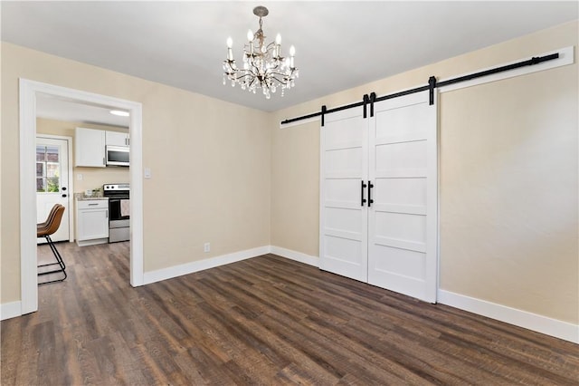 4649 Rolling Hills Rd, Whitehall, PA 15236 - empty room with a barn door, dark wood finished floors, a chandelier, and baseboards