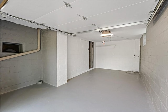 4649 Rolling Hills Rd, Whitehall, PA 15236 - garage featuring concrete block wall and a garage door opener